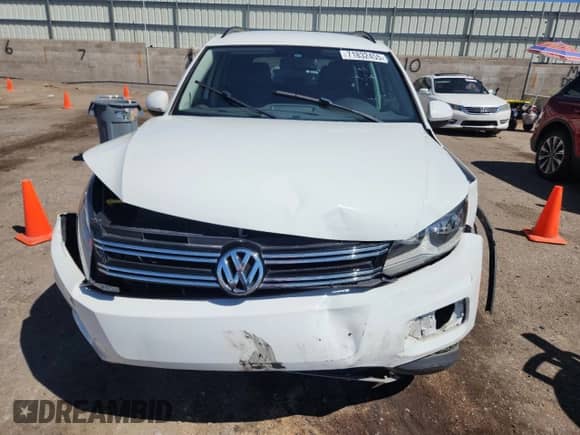 2016 Volkswagen Tiguan S z VIN WVGAV7AX0GW602944, wystawiony jako Copart lot #71832455 z przebiegiem 80 203 mil mil oraz Szkoda całkowita • Salvage title. Historia ofert i sprzedaży dostępna na DreamBid. Obrazek 5.