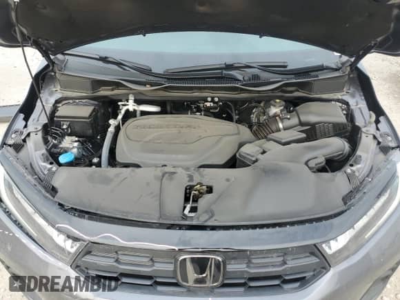 2025 Honda Odyssey EX-L with VIN 5FNRL6H65SB037589, listed as a Copart auction lot 80814375 with 7,840 mi miles and Salvage title. Bid and sale history available at DreamBid. Image 12.