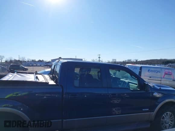 2014 Ford F-150 XL with VIN 1FTFW1ETXEKD19533, listed as a IAAI auction lot 41080946 with 175,948 mi miles and . Bid and sale history available at DreamBid. Image 14.