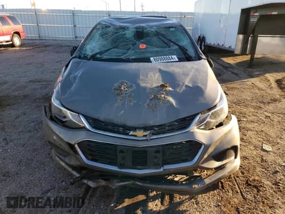 2018 Chevrolet Cruze LT z VIN 3G1BH6SE3JS636492, wystawiony jako Copart lot #80988884 z przebiegiem Nie podano mil oraz Szkoda całkowita • Salvage title. Historia ofert i sprzedaży dostępna na DreamBid. Obrazek 5.