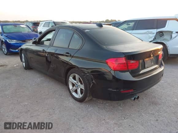2014 BMW 3 Series 328i with VIN WBA3C1C59EK107882, listed as a IAAI auction lot 43398971 with 187,068 mi miles and . Bid and sale history available at DreamBid. Image 3.