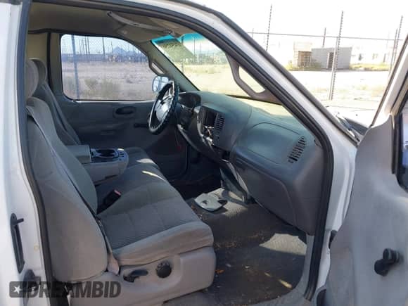 2002 Ford F-150 XL with VIN 1FTRX17252KA55387, listed as a IAAI auction lot 43454256 with 162,516 mi miles and . Bid and sale history available at DreamBid. Image 5.