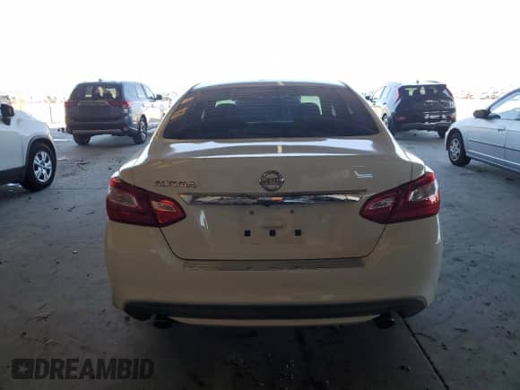 2016 Nissan Altima S with VIN 1N4AL3AP9GC167142, listed as a Copart auction lot 80840275 with 116,721 mi miles and Salvage title. Bid and sale history available at DreamBid. Image 6.