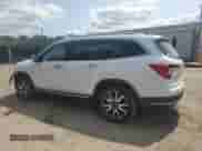 2020 Honda Pilot Touring 8-Passenger z VIN 5FNYF6H94LB051790, wystawiony jako Copart lot #67845865 z przebiegiem 63 874 mil mil oraz Szkoda całkowita • Salvage title. Historia ofert i sprzedaży dostępna na DreamBid. Obrazek 2.