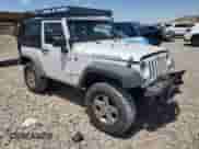 2011 Jeep Wrangler Rubicon with VIN 1J4BA6D12BL535953, listed as a Copart auction lot 59401595 with 77,451 mi miles and Salvage title. Bid and sale history available at DreamBid. Image 4.