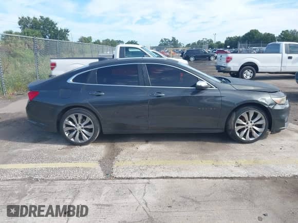 2017 Chevrolet Malibu Premier z VIN 1G1ZH5SXXHF235532, wystawiony jako IAAI lot #43264308 z przebiegiem 174 855 mil mil oraz . Historia ofert i sprzedaży dostępna na DreamBid. Obrazek 12.