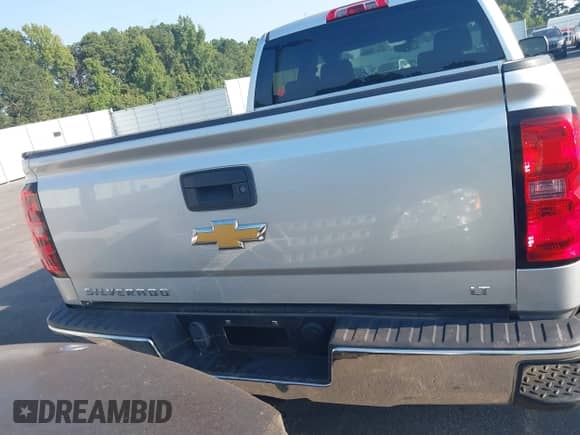 2014 Chevrolet Silverado 1500 LT with VIN 3GCPCREHXEG259073, listed as a IAAI auction lot 43010013 with 128,000 mi miles and . Bid and sale history available at DreamBid. Image 16.