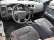 2006 Dodge Dakota с VIN 1D3HW42N46S612420, выставлен на аукционе Copart как лот 63764385 с пробегом 168 909 миль миль и Списание • Salvage title. История ставок и продаж доступна на DreamBid. Изображение 8.