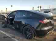 2022 Tesla Model Y Performance with VIN 7SAYGDEF9NF393852, listed as a Copart auction lot 63141094 with 26,972 mi miles and Salvage title. Bid and sale history available at DreamBid. Image 2.
