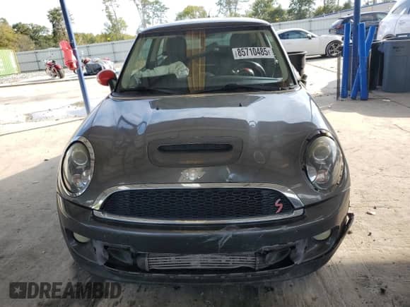 2012 MINI Hardtop S с VIN WMWSV3C55CT385588, выставлен на аукционе Copart как лот 85710485 с пробегом Не указан миль и Списание • Salvage title. История ставок и продаж доступна на DreamBid. Изображение 5.