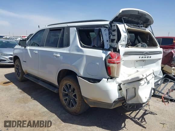 2021 Chevrolet Tahoe Z71 z VIN 1GNSKPKD6MR292371, wystawiony jako IAAI lot #41862119 z przebiegiem 81 119 mil mil oraz . Historia ofert i sprzedaży dostępna na DreamBid. Obrazek 3.