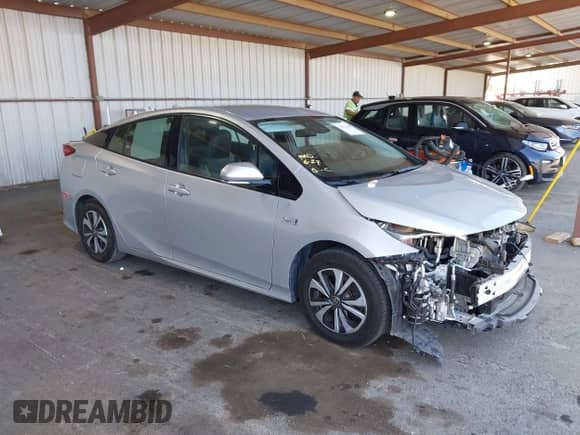 2018 Toyota Prius Plus z VIN JTDKARFP9J3078890, wystawiony jako IAAI lot #42617146 z przebiegiem 59 270 mil mil oraz . Historia ofert i sprzedaży dostępna na DreamBid. Obrazek 1.