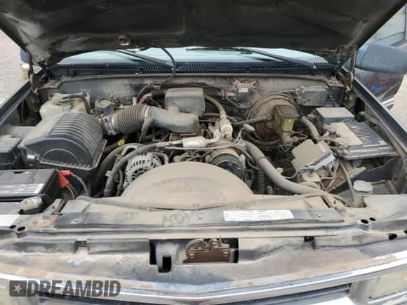 1999 Chevrolet Suburban z VIN 3GNFK16R1XG223449, wystawiony jako Copart lot #71675635 z przebiegiem 220 439 mil mil oraz Szkoda całkowita • Salvage title. Historia ofert i sprzedaży dostępna na DreamBid. Obrazek 12.