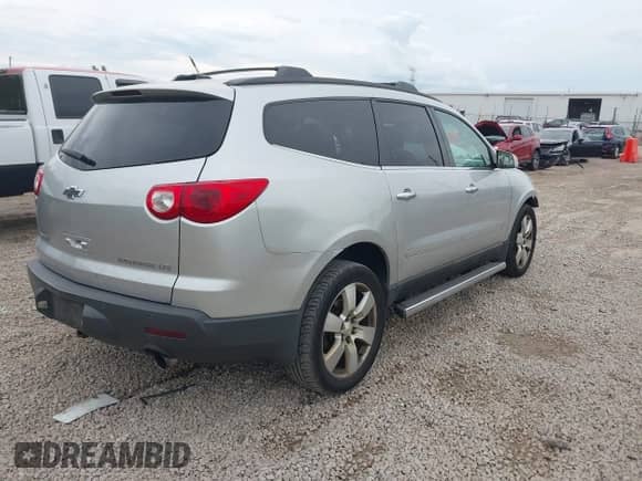 2009 Chevrolet Traverse LTZ with VIN 1GNEV33D69S116223, listed as a IAAI auction lot 43086427 with 172,790 mi miles and . Bid and sale history available at DreamBid. Image 4.
