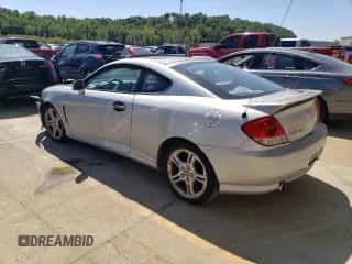 2006 Hyundai Tiburon GT с VIN KMHHN65F76U216025, выставлен на аукционе Copart как лот 74443474 с пробегом 139 626 миль миль и На запчасти • Non repairable. История ставок и продаж доступна на DreamBid. Изображение 3.