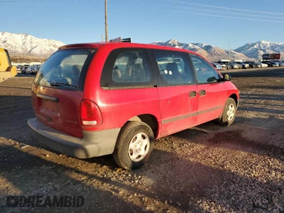 2000 Dodge Caravan with VIN 2B4FP25B6YR745975, listed as a Copart auction lot 87710025 with 151,949 mi miles and Salvage title. Bid and sale history available at DreamBid. Image 3.