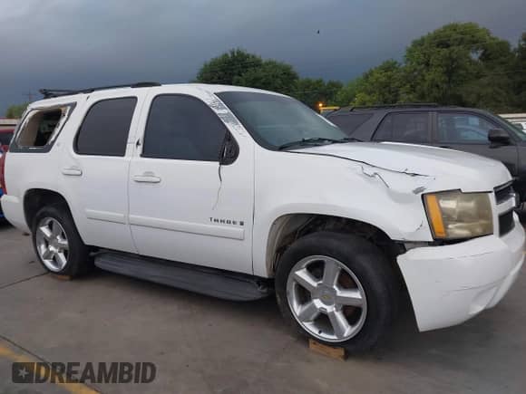 2007 Chevrolet Tahoe LS с VIN 1GNFC13J97R281157, выставлен на аукционе IAAI как лот 42167329 с пробегом Не указан миль и . История ставок и продаж доступна на DreamBid. Изображение 6.