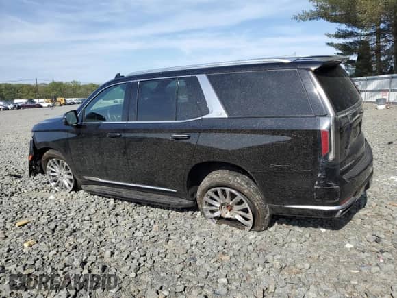 2022 Cadillac Escalade Premium Luxury с VIN 1GYS4BKL9NR143137, выставлен на аукционе Copart как лот 55145505 с пробегом 56 001 миль миль и Списание • Salvage title. История ставок и продаж доступна на DreamBid. Изображение 2.