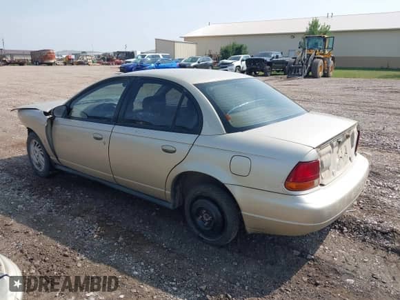 1998 Saturn SL with VIN 1G8ZJ5270WZ203979, listed as a IAAI auction lot 43135380 with 212,673 mi miles and . Bid and sale history available at DreamBid. Image 3.