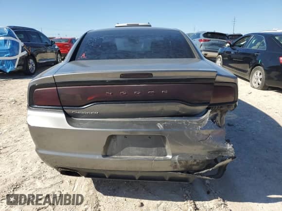 2012 Dodge Charger SE z VIN 2C3CDXBG0CH240044, wystawiony jako Copart lot #64459465 z przebiegiem 211 645 mil mil oraz Szkoda całkowita • Salvage title. Historia ofert i sprzedaży dostępna na DreamBid. Obrazek 6.