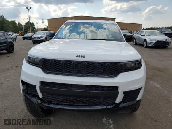 2023 Jeep Grand Cherokee Laredo z VIN 1C4RJJAG1P8879865, wystawiony jako Copart lot #71516035 z przebiegiem 18 657 mil mil oraz Szkoda całkowita • Salvage title. Historia ofert i sprzedaży dostępna na DreamBid. Obrazek 5.