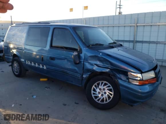 1994 Dodge Caravan Grand SE with VIN 1B4GH44R1RX330819, listed as a Copart auction lot 83548684 with 187,408 mi miles and Salvage title. Bid and sale history available at DreamBid. Image 4.