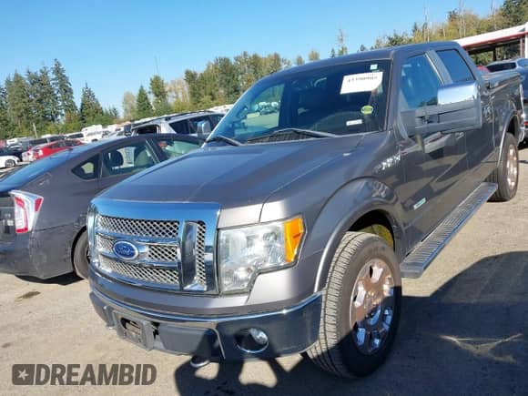 2011 Ford F-150 Lariat with VIN 1FTFW1ET1BFA82757, listed as a IAAI auction lot 43390905 with 128,796 mi miles and . Bid and sale history available at DreamBid. Image 17.