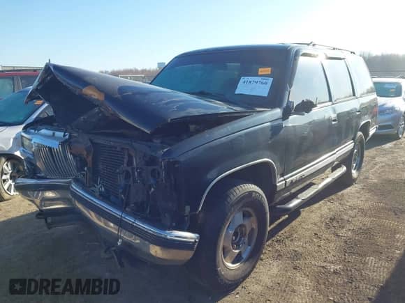 1996 Chevrolet Tahoe with VIN 1GNEK13RXTJ418622, listed as a IAAI auction lot 41879760 with 349,211 mi miles and . Bid and sale history available at DreamBid. Image 2.