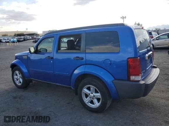 2007 Dodge Nitro SLT with VIN 1D8GT58K97W666341, listed as a Copart auction lot 69343634 with 168,897 mi miles and Salvage title. Bid and sale history available at DreamBid. Image 2.