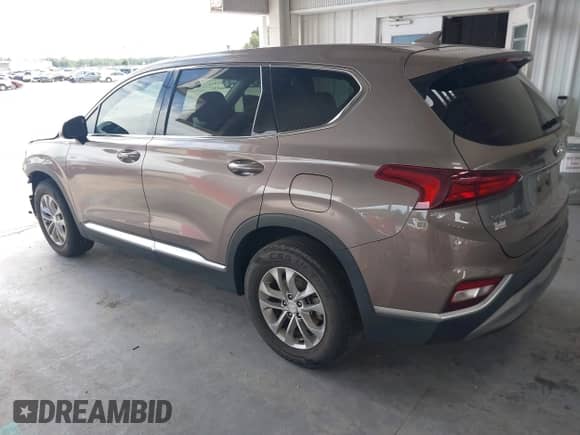 2019 Hyundai Santa Fe SEL с VIN 5NMS3CAD7KH078717, выставлен на аукционе IAAI как лот 43065754 с пробегом 78 510 миль миль и . История ставок и продаж доступна на DreamBid. Изображение 3.