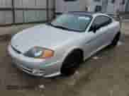 2003 Hyundai Tiburon GT с VIN KMHHN65F03U079618, выставлен на аукционе Copart как лот 47642965 с пробегом 87 483 миль миль и Чистый • Clean title. История ставок и продаж доступна на DreamBid. Изображение 1.