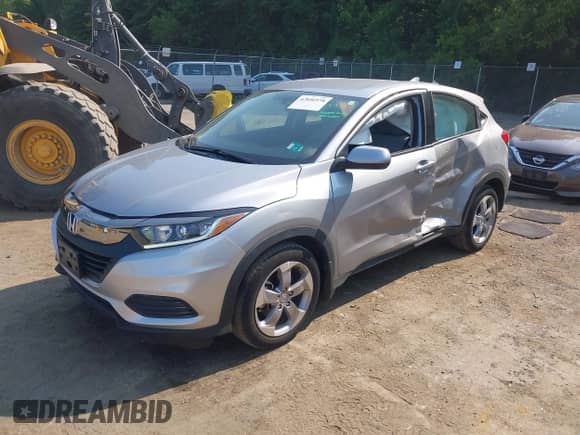 2022 Honda HR-V LX z VIN 3CZRU6H39NM763307, wystawiony jako IAAI lot #42856978 z przebiegiem 27 503 mil mil oraz . Historia ofert i sprzedaży dostępna na DreamBid. Obrazek 2.