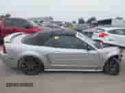 2003 Ford Mustang Deluxe z VIN 1FAFP44403F377882, wystawiony jako IAAI lot #43115789 z przebiegiem 77 266 mil mil oraz . Historia ofert i sprzedaży dostępna na DreamBid. Obrazek 13.