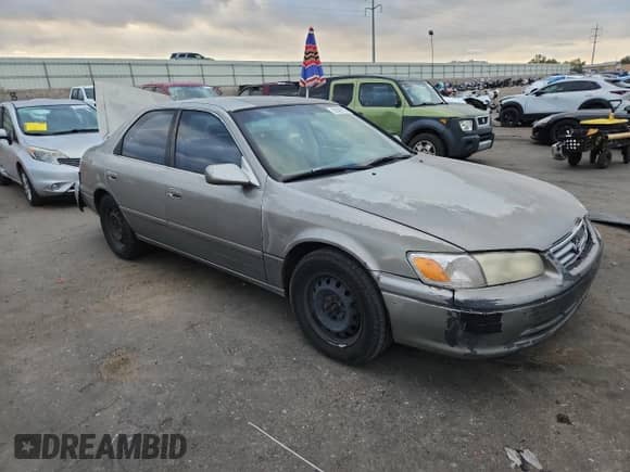 2001 Toyota Camry LE with VIN JT2BG22K510537679, listed as a Copart auction lot 85005725 with 243,643 mi miles and Salvage title. Bid and sale history available at DreamBid. Image 4.