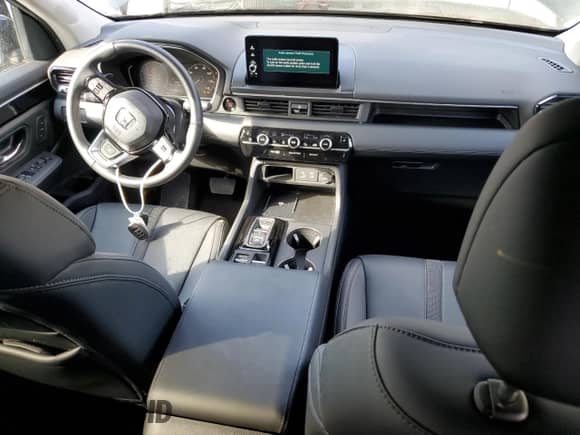 2024 Honda Pilot EX-L with VIN 5FNYG1H51RB019899, listed as a Copart auction lot 75478704 with 7,397 mi miles and Salvage title. Bid and sale history available at DreamBid. Image 8.