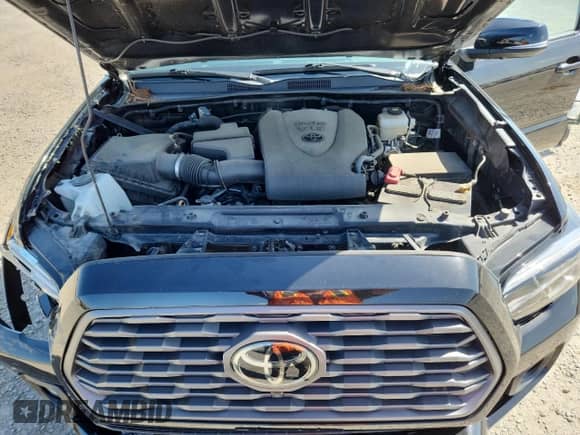 2021 Toyota Tacoma SR5 с VIN 3TMDZ5BN0MM105234, выставлен на аукционе Copart как лот 84907005 с пробегом 57 266 миль миль и Списание • Salvage title. История ставок и продаж доступна на DreamBid. Изображение 11.