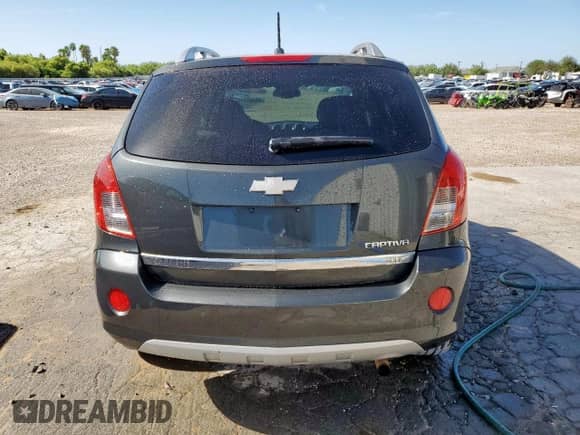 2015 Chevrolet Captiva Sport LTZ z VIN 3GNAL4EK8FS513387, wystawiony jako Copart lot #66967475 z przebiegiem 107 860 mil mil oraz Czysty tytuł • Clean title. Historia ofert i sprzedaży dostępna na DreamBid. Obrazek 6.