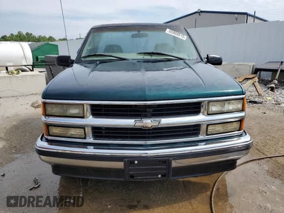 1998 Chevrolet Silverado 1500 with VIN 1GCEC14R9WZ161169, listed as a Copart auction lot 65908815 with 106,967 mi miles and Salvage title. Bid and sale history available at DreamBid. Image 5.