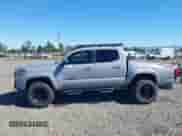 2019 Toyota Tacoma SR z VIN 5TFCZ5AN8KX193437, wystawiony jako IAAI lot #43278180 z przebiegiem 70 048 mil mil oraz . Historia ofert i sprzedaży dostępna na DreamBid. Obrazek 15.