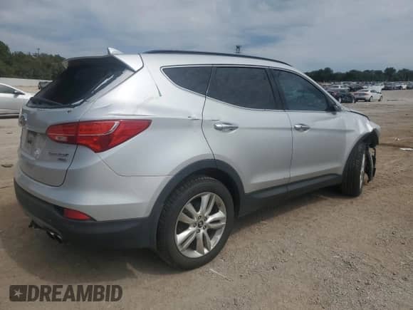 2014 Hyundai Santa Fe with VIN 5XYZWDLA7EG166440, listed as a Copart auction lot 72062825 with 187,966 mi miles and Salvage title. Bid and sale history available at DreamBid. Image 3.
