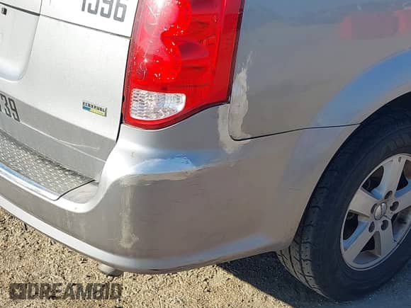 2013 Dodge Grand Caravan SXT with VIN 2C4RDGCG1DR580447, listed as a IAAI auction lot 43373907 with 265,396 mi miles and . Bid and sale history available at DreamBid. Image 12.