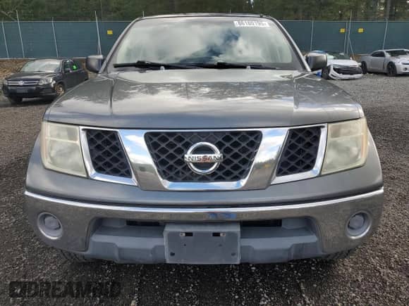 2007 Nissan Frontier LE with VIN 1N6AD07W57C433208, listed as a Copart auction lot 86180195 with 256,124 mi miles and Salvage title. Bid and sale history available at DreamBid. Image 5.