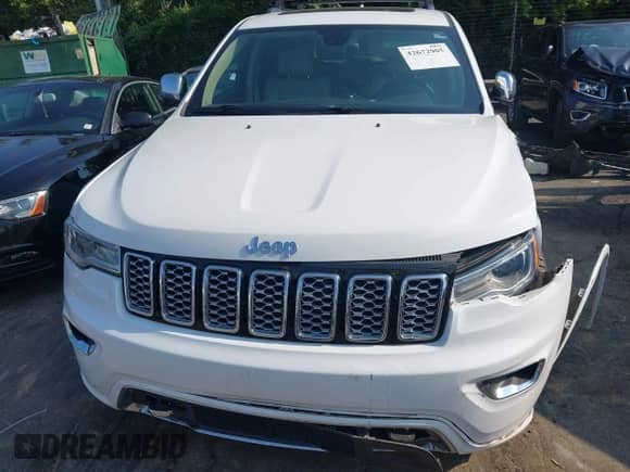 2017 Jeep Grand Cherokee Overland with VIN 1C4RJFCG1HC633004, listed as a IAAI auction lot 42672905 with 138,018 mi miles and . Bid and sale history available at DreamBid. Image 12.