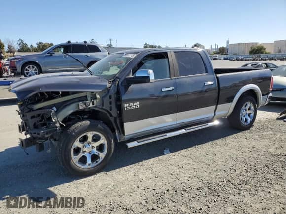 2015 Ram 1500 Laramie z VIN 1C6RR7VT4FS666856, wystawiony jako Copart lot #58083145 z przebiegiem 9 552 mil mil oraz Szkoda całkowita • Salvage title. Historia ofert i sprzedaży dostępna na DreamBid. Obrazek 1.