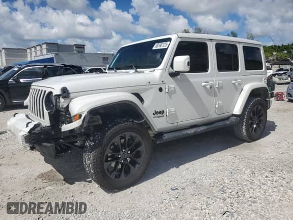 2021 Jeep Wrangler Unlimited Sahara High Altitude with VIN 1C4HJXENXMW558809, listed as a Copart auction lot 68598125 with 86,070 mi miles and Salvage title. Bid and sale history available at DreamBid. Image 1.