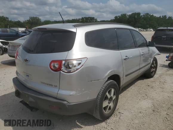 2012 Chevrolet Traverse LS with VIN 1GNKRFED3CJ400508, listed as a Copart auction lot 64611055 with 154,095 mi miles and Salvage title. Bid and sale history available at DreamBid. Image 3.