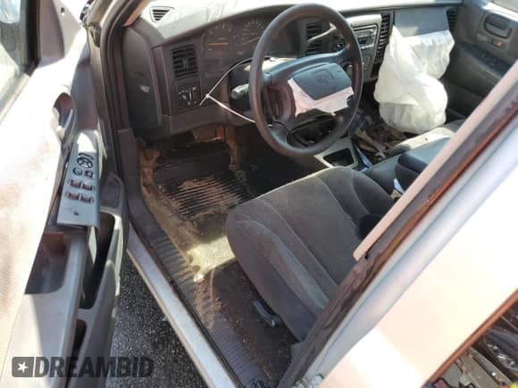 2002 Dodge Dakota Sport z VIN 1B7HL38N32S503296, wystawiony jako Copart lot #75428444 z przebiegiem 239 482 mil mil oraz Szkoda całkowita • Salvage title. Historia ofert i sprzedaży dostępna na DreamBid. Obrazek 8.