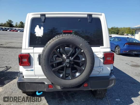 2024 Jeep Wrangler Sahara with VIN 1C4RJXP69RW276890, listed as a Copart auction lot 81291715 with 31,296 mi miles and Salvage title. Bid and sale history available at DreamBid. Image 6.