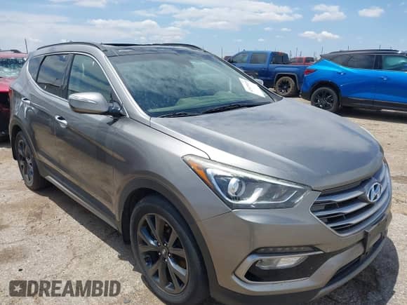 2018 Hyundai Santa Fe Ultimate with VIN 5XYZWDLAXJG531204, listed as a IAAI auction lot 42473418 with 90,726 mi miles and . Bid and sale history available at DreamBid. Image 1.