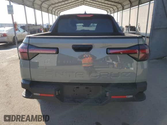 2025 Hyundai Santa Cruz SEL с VIN 5NTJB4DE1SH127083, выставлен на аукционе Copart как лот 43238065 с пробегом 5 366 миль миль и Списание • Salvage title. История ставок и продаж доступна на DreamBid. Изображение 6.